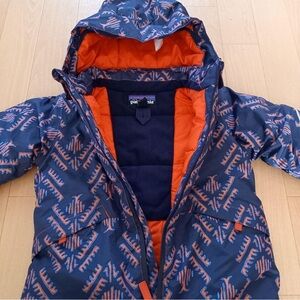 Patagonia kids Snow Pile 2T Navy and Orange Patterned one piece